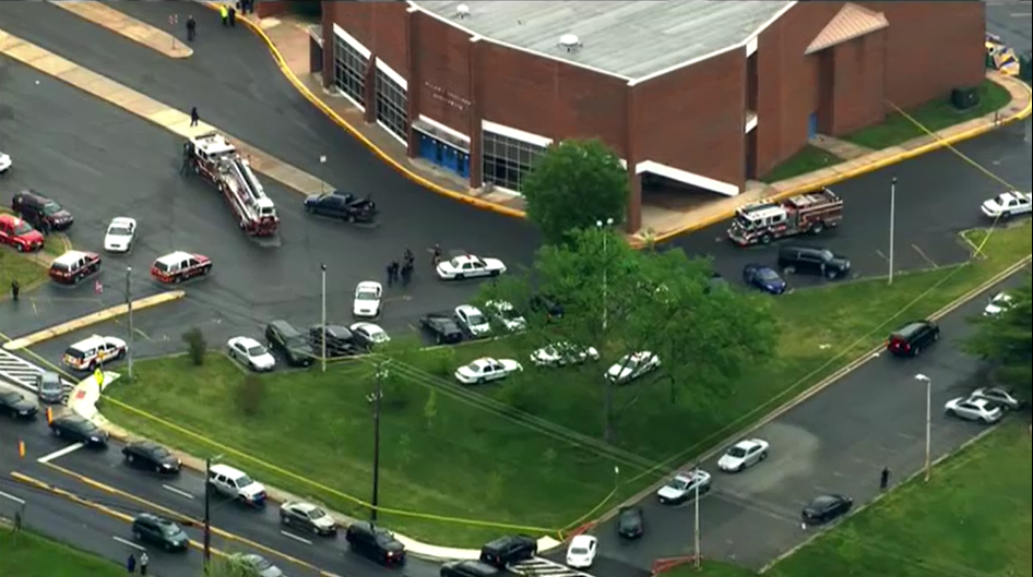 Police looking for suspect who killed 1, wounded 1 in domestic shooting at high school WJLA