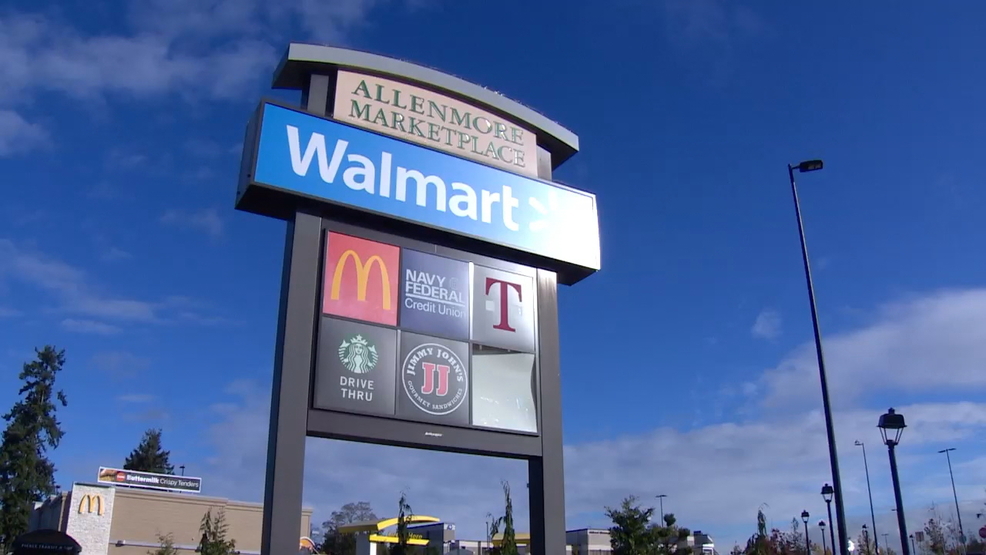 to pay 2.8 million to local developer for delaying WalMart