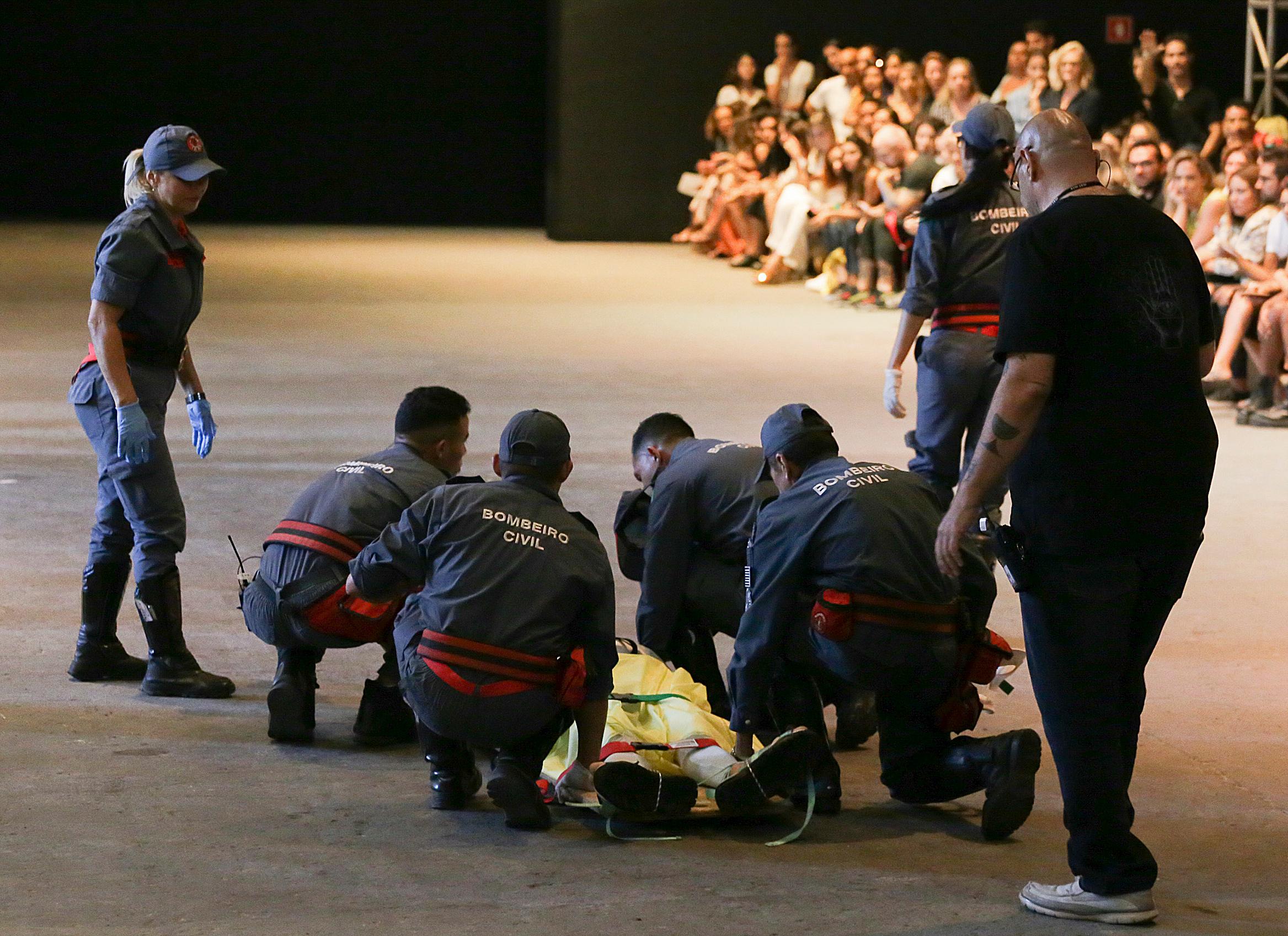 model tales soares is taken from the catwalk by paramedics after