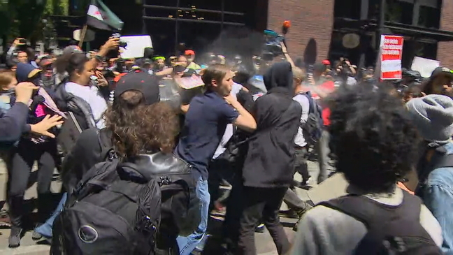 Scuffle, pepper spray, arrests in Pioneer Square after day of protests